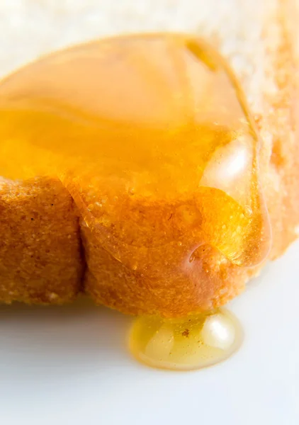 Μέλι στο ένα ψωμί — Φωτογραφία Αρχείου