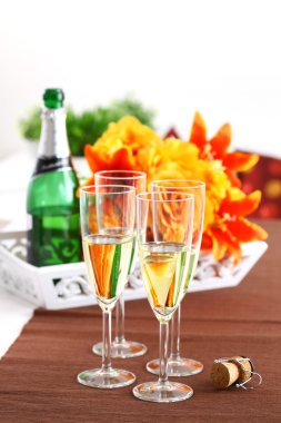 Sparkling wine on the table clipart