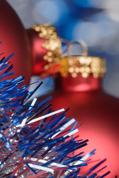 Tinsel and Christmas baubel — Stock Photo, Image