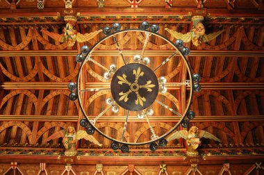 Chandeliers hanging from the ceiling inside Cardiff Castle, Wales clipart