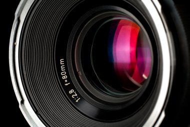 Close-up of photographic lens clipart