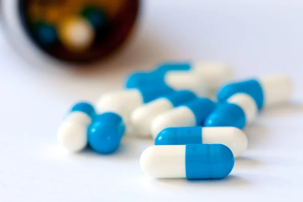 stock image Pills - white-blue capsules