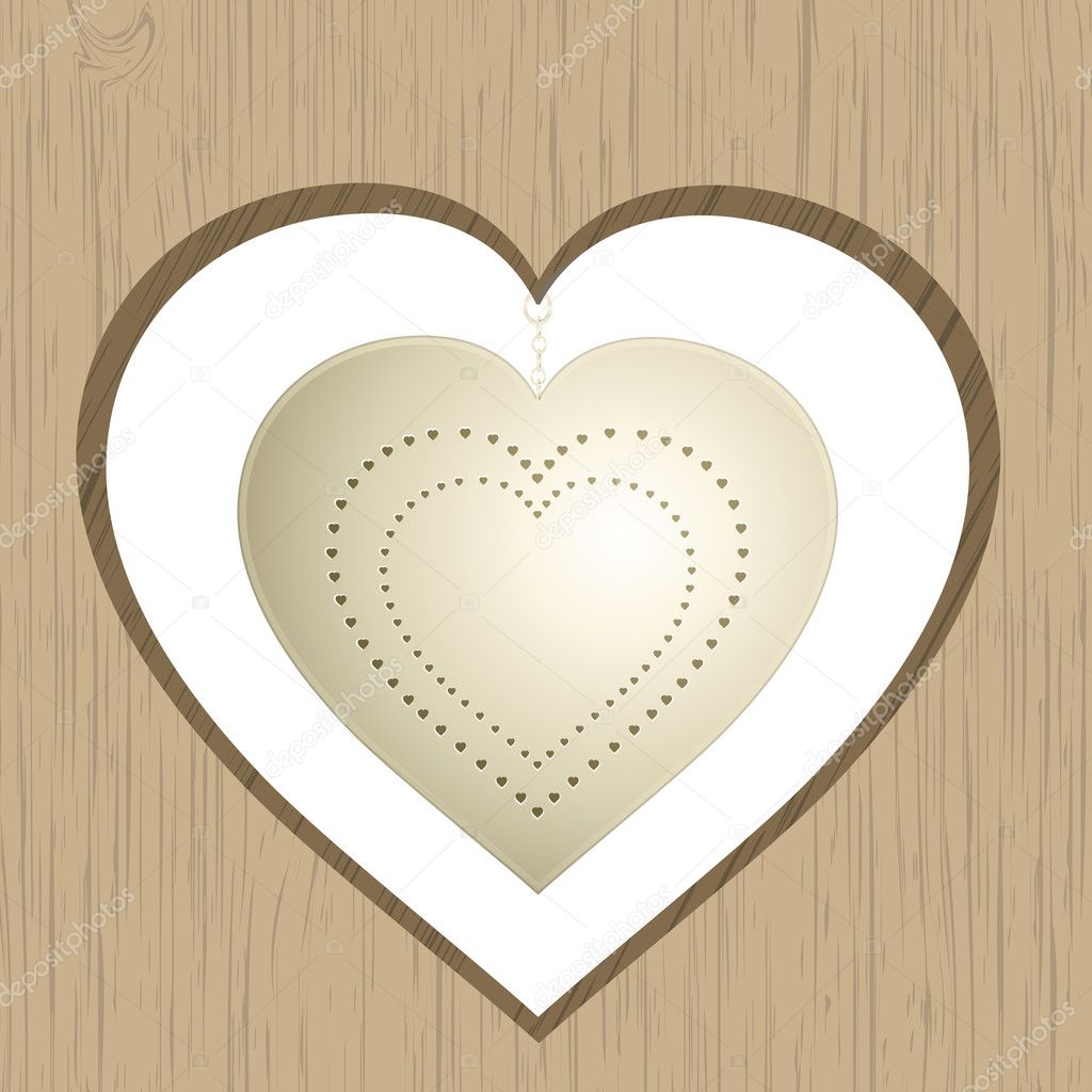 Vintage heart hanging from wood