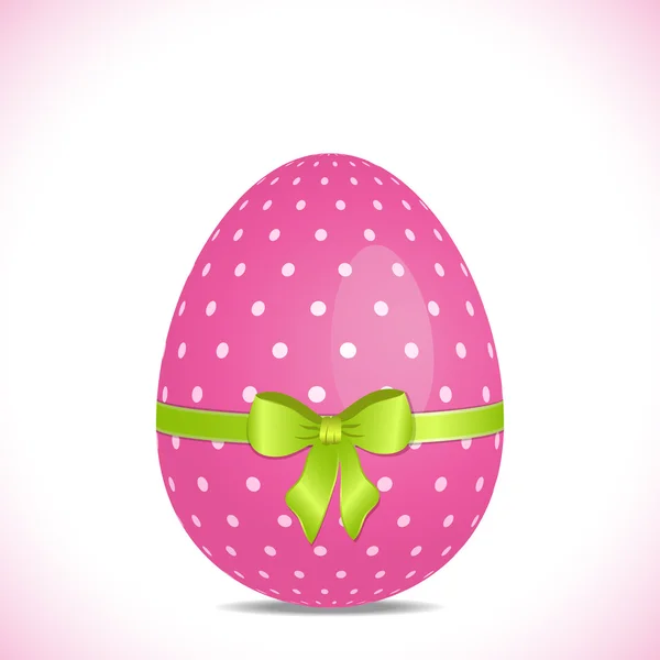 Stock vector Pink polka dot easter egg with green ribbon