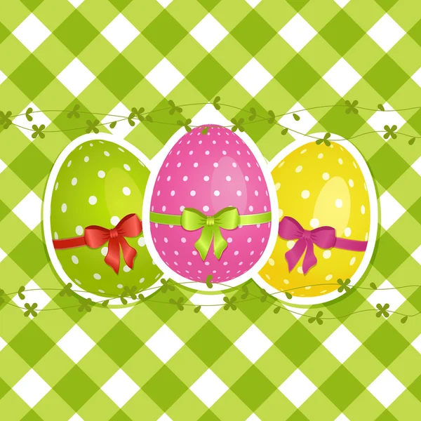 Easter eggs on a green gingham border — Stock Vector