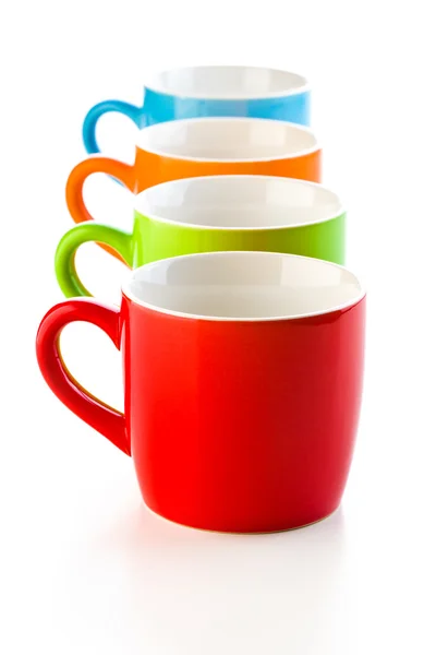 Colorful ceramic mugs — Stock Photo, Image