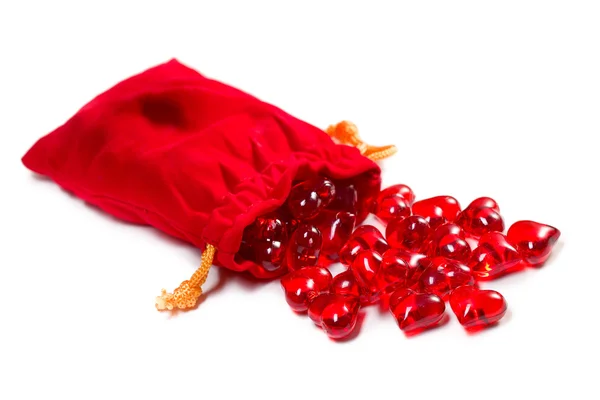 Corações vermelhos no saco vermelho — Fotografia de Stock