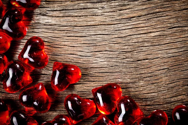 Red glass hearts background — Stock Photo, Image