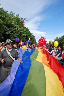 Participants parade at Gay Fest Parade clipart