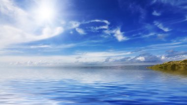 Calm seas and blue skies clipart