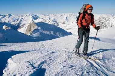 Ski touring in the Alps clipart