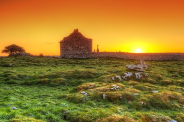 Ruins of old Irish chapel in Burren clipart