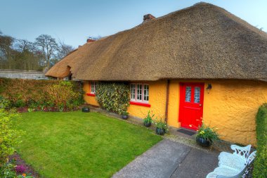 Traditional cottage house in Adare clipart