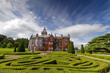 Adare manor in red ivy and gardens clipart