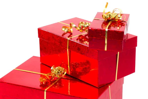 Kırmızı hediye kutuları ile altın şerit — Stok fotoğraf