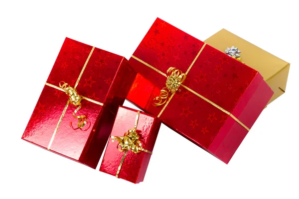 Cajas de regalo rojas con cinta dorada —  Fotos de Stock