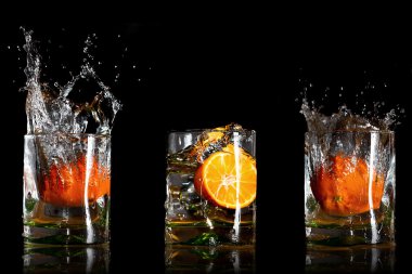 Splashing drinks with oranges clipart