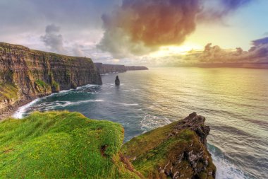 Cliffs of Moher at sunset clipart