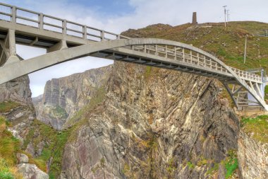 Bridge to at Mizen Head and Lighthouse clipart