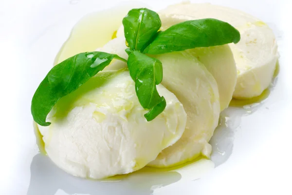 Mozzarella cheese with basil — Stock Photo, Image