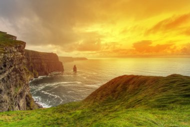 Amazing sunset at Cliffs of Moher clipart
