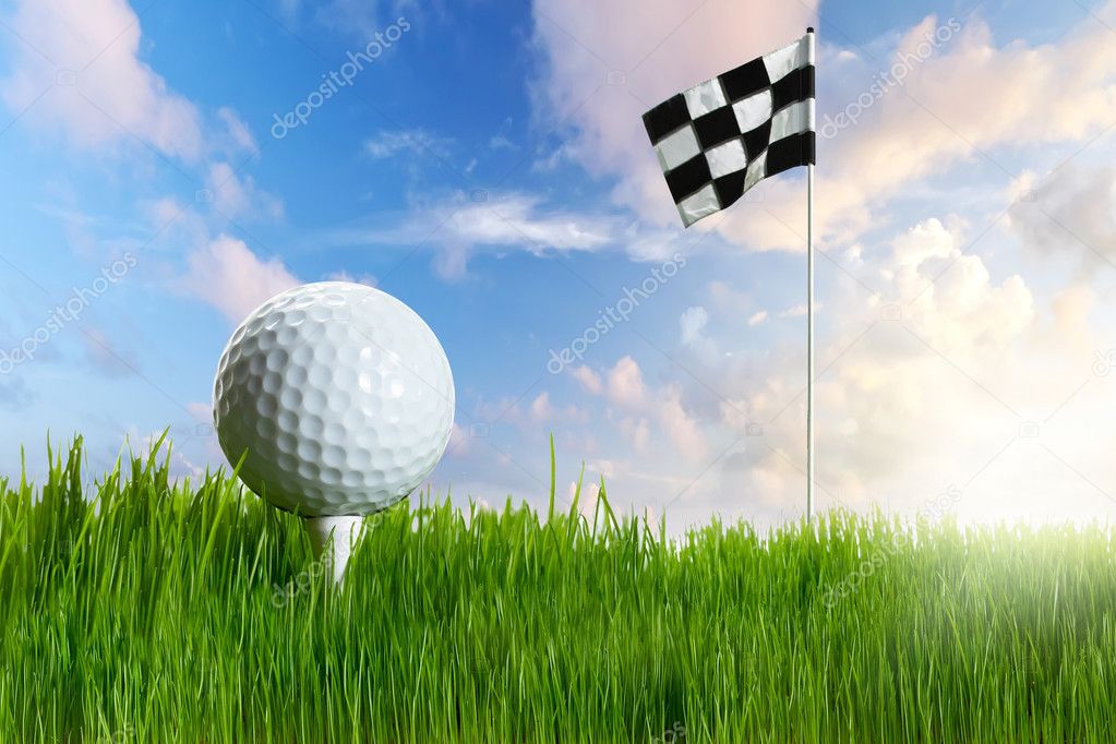Golf ball on the tee with flag