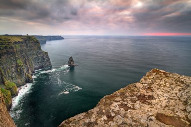 Cliffs of Moher at sunset clipart