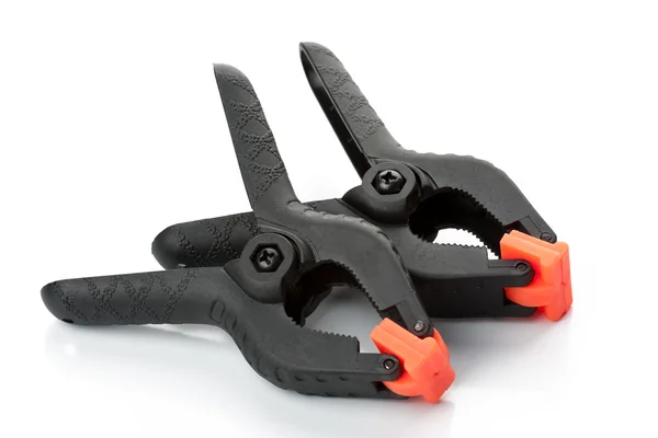 Black plastic clamps — Stock Photo, Image
