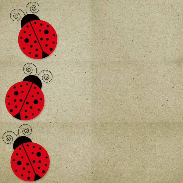 Paper background with ladybugs — Stock Photo, Image
