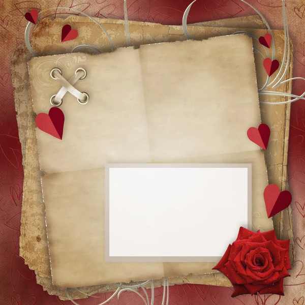 Kaart naar St. Valentine's Day groeten met hartjes en oud papier — Stockfoto