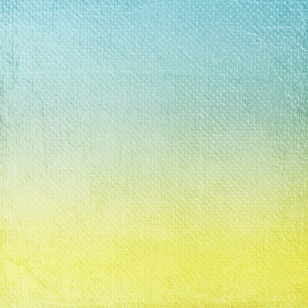 Um fundo de papel em amarelo e azul — Fotografia de Stock