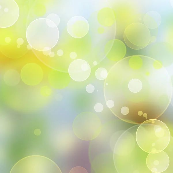 Абстрактний кольоровий фон з розмитими колами в зеленому, жовтому — стокове фото