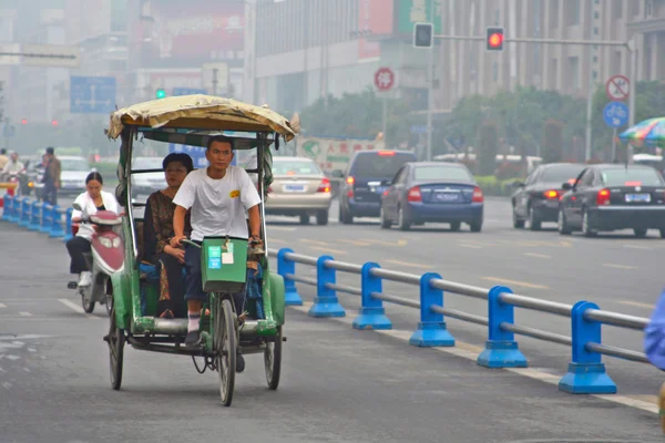 Special line for bicyles, pedicabs on the multilane road, China — Stock Photo, Image