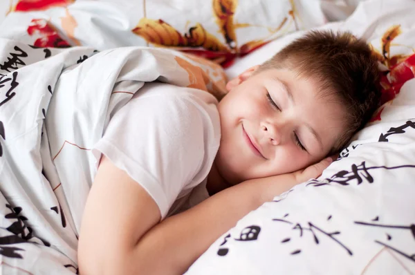 stock image The boy was asleep on a pillow with Chinese characters