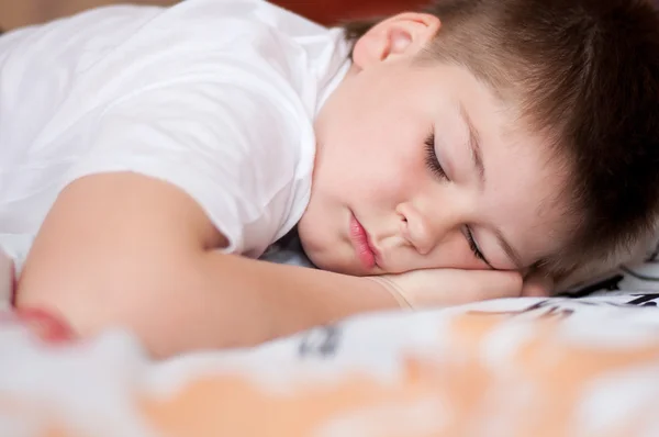 stock image The boy was asleep on a pillow with Chinese characters