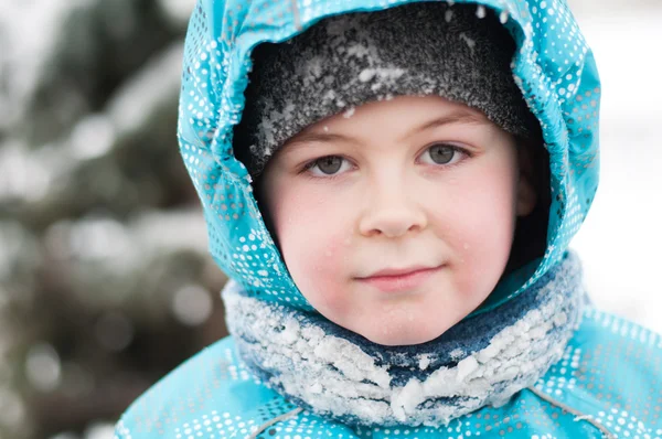 Portrait of a boy with wet snow from the face of — Stock Photo, Image