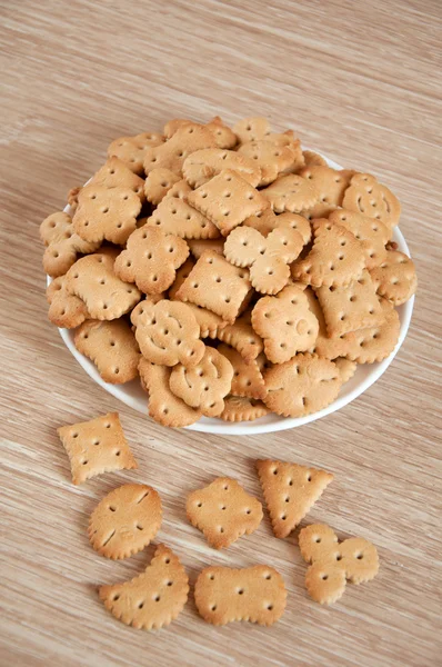 As crianças imaginaram biscoitos em um prato — Fotografia de Stock