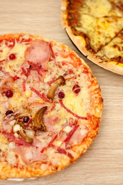Appetizing pizza with mushrooms and ham — Stock Photo, Image