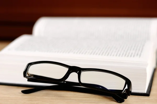 stock image Book and eyeglasses