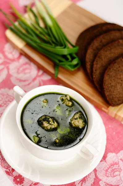Soup with spinach and meatballs — Stock Photo, Image