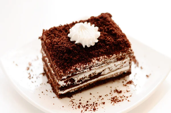 Bolo delicioso com chocolate escuro — Fotografia de Stock