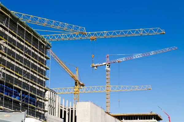 stock image Cranes on a construction site