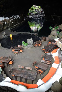 Restaurant in volcano cave clipart