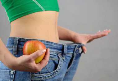 Women become skinny with apple diet clipart