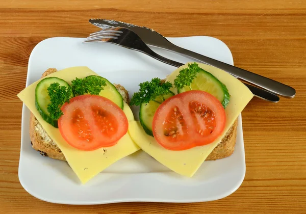 Stock image Ready breakfast sandwiches on the table background