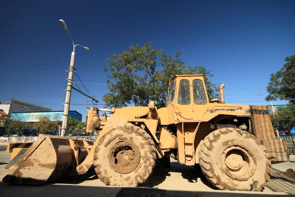 Heavy Duty Construction Equipment Parked at Worksite Stock Image