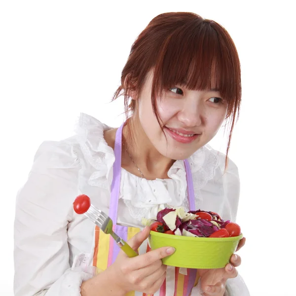 A Chinese woman with vegetable isolated on white. — Stock Photo, Image