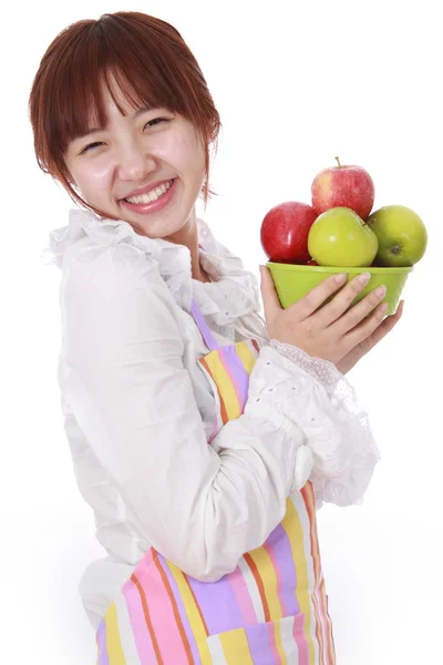 Μια κινεζική γυναίκα με φρούτα που απομονώνονται σε λευκό. — Φωτογραφία Αρχείου