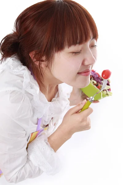 Una donna cinese con verdure isolate su bianco . — Foto Stock