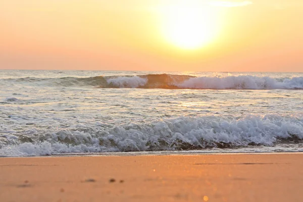 Sunset at coast of the sea — Stock Photo, Image